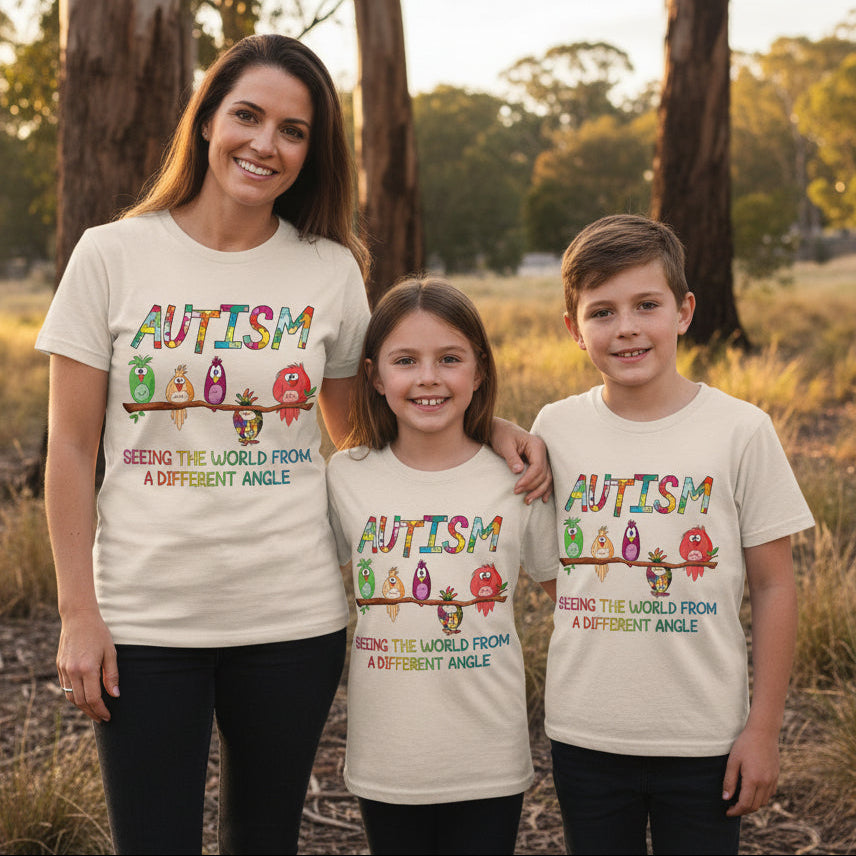 Autism awareness t-shirt Australia colourful birds design seeing the world from a different angle neurodiversity shirt beige tee