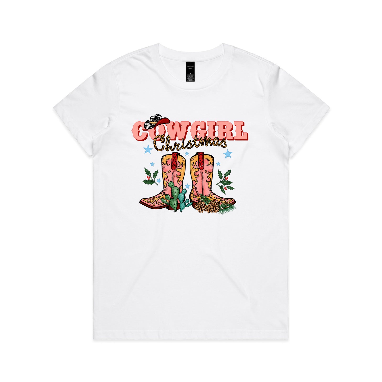 T-shirt with a Cowgirl Christmas design featuring pink western boots, a cow print hat, cactus and holly.