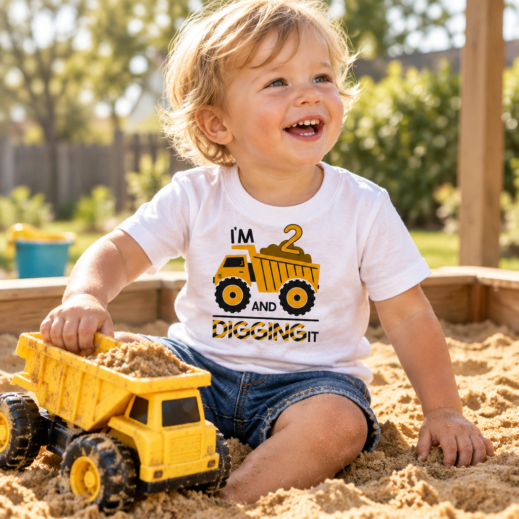 White toddler t-shirt with yellow dump truck and personalised "I'm digging it" birthday age design