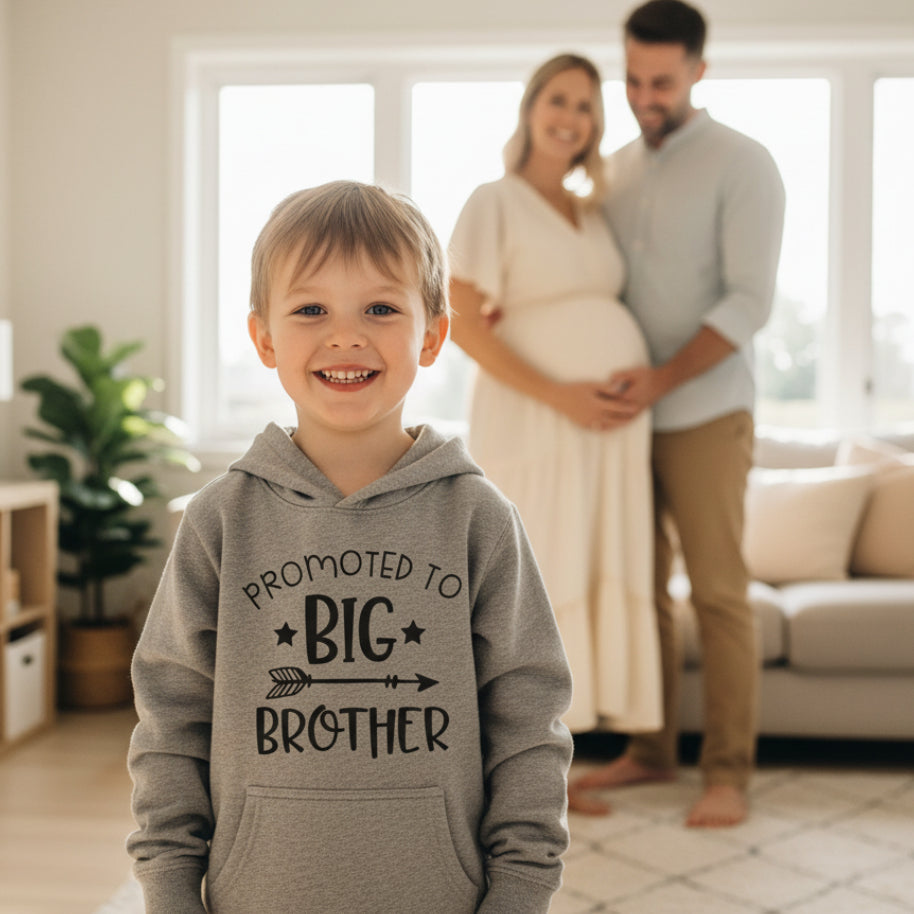 Gray hoodie with 'Promoted to Big Brother' text on a white background