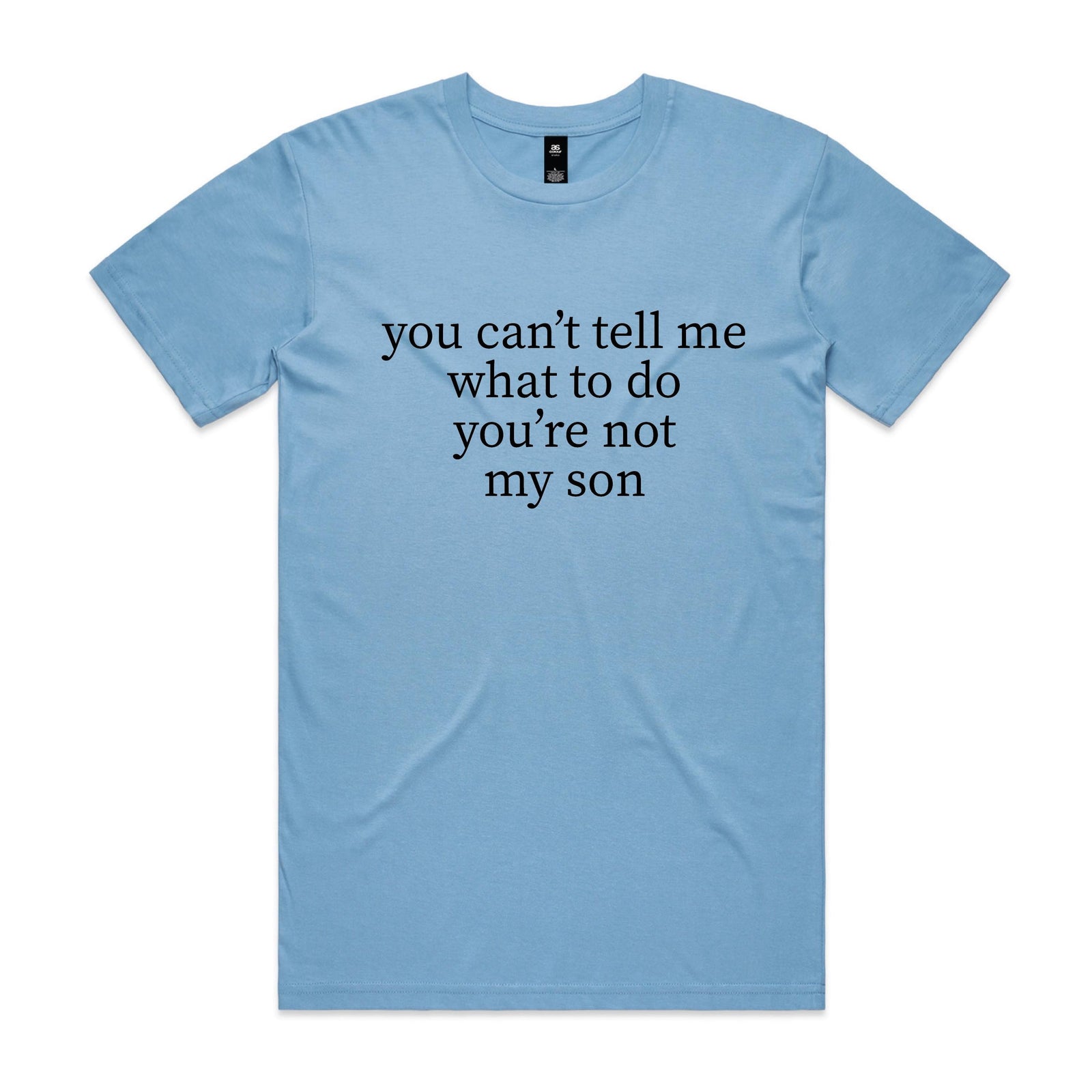 Laughing dad in a backyard wearing a light blue t-shirt with black serif text reading You Can't Tell Me What To Do You're Not My Son.