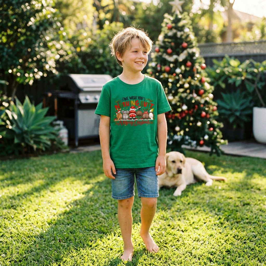 A green short-sleeve crewneck t-shirt featuring a colorful Christmas-themed graphic with cartoon AUstralian animals from behind and the text 'WE WISH YOU NOTHING BUTT A Merry Christmas'
