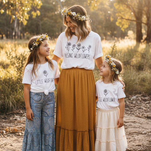 Raising Wildflowers text printed on neutral t-shirt with boho styling, Mother’s Day gift idea