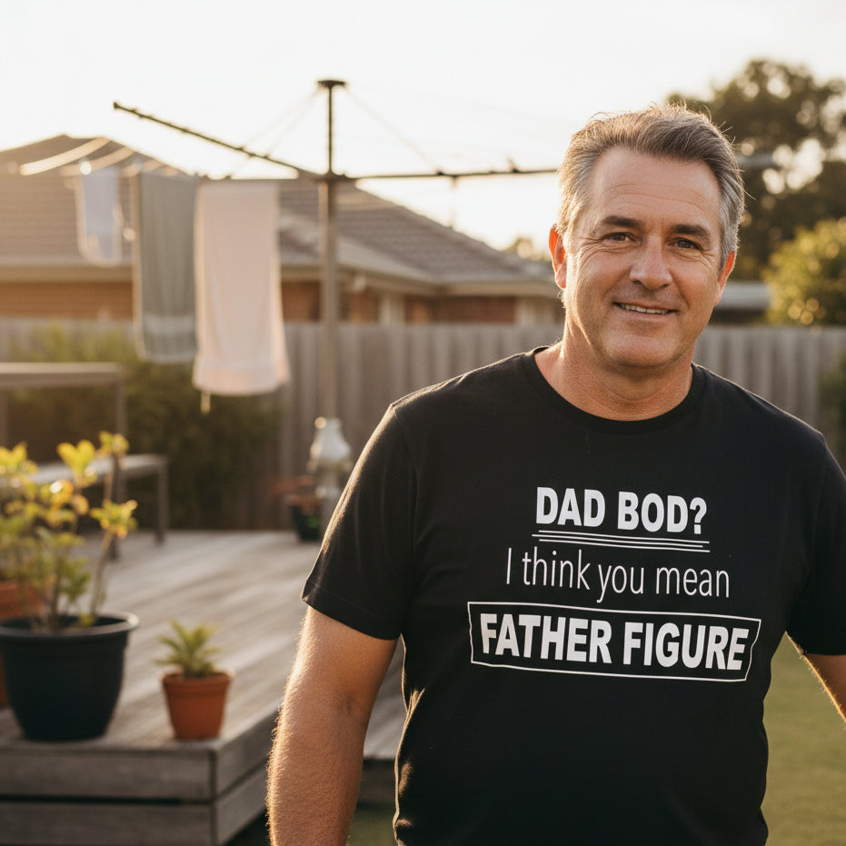 Black t-shirt reading Dad Bod? I think you mean Father Figure in bold white lettering.