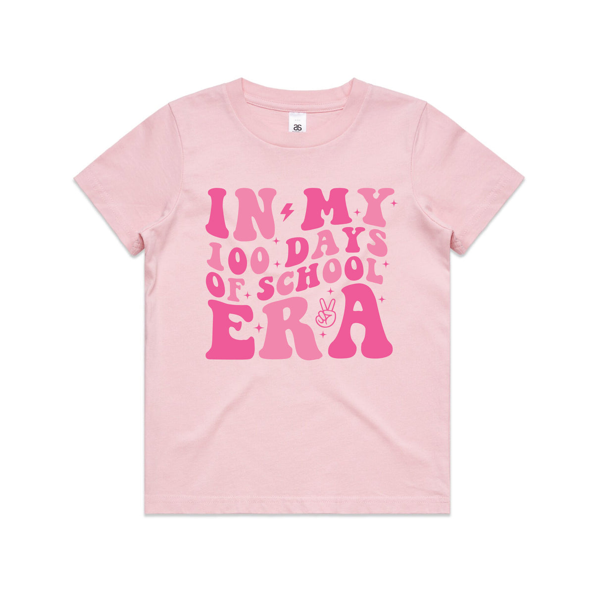A light pink short-sleeve t-shirt with a vibrant pink retro-style graphic on the front that reads 'IN MY 100 DAYS OF SCHOOL ERA' with small decorative details like stars, lightning bolts, and a peace sign, shown on a plain white background.