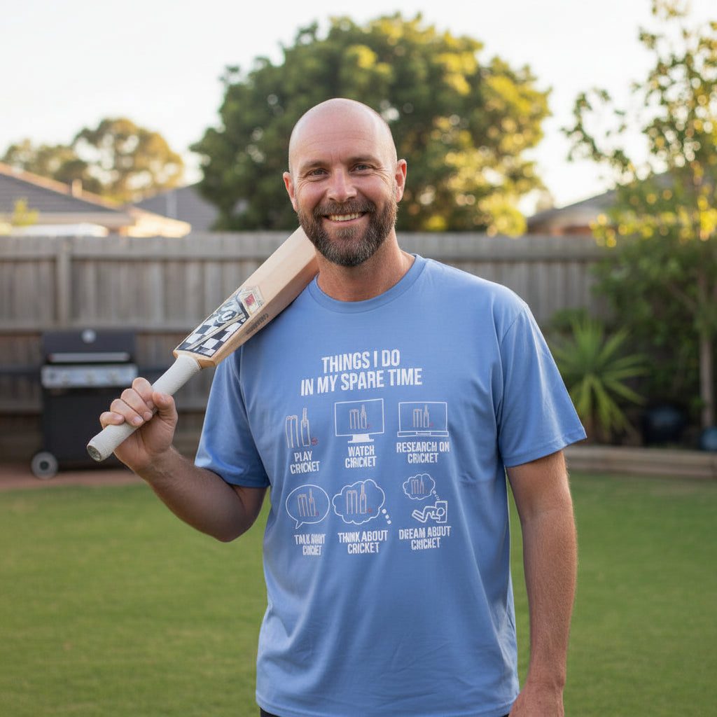 Blue t-shirt reading Things I Do In My Spare Time with six cricket icons for play, watch, research, talk, think and dream about cricket.