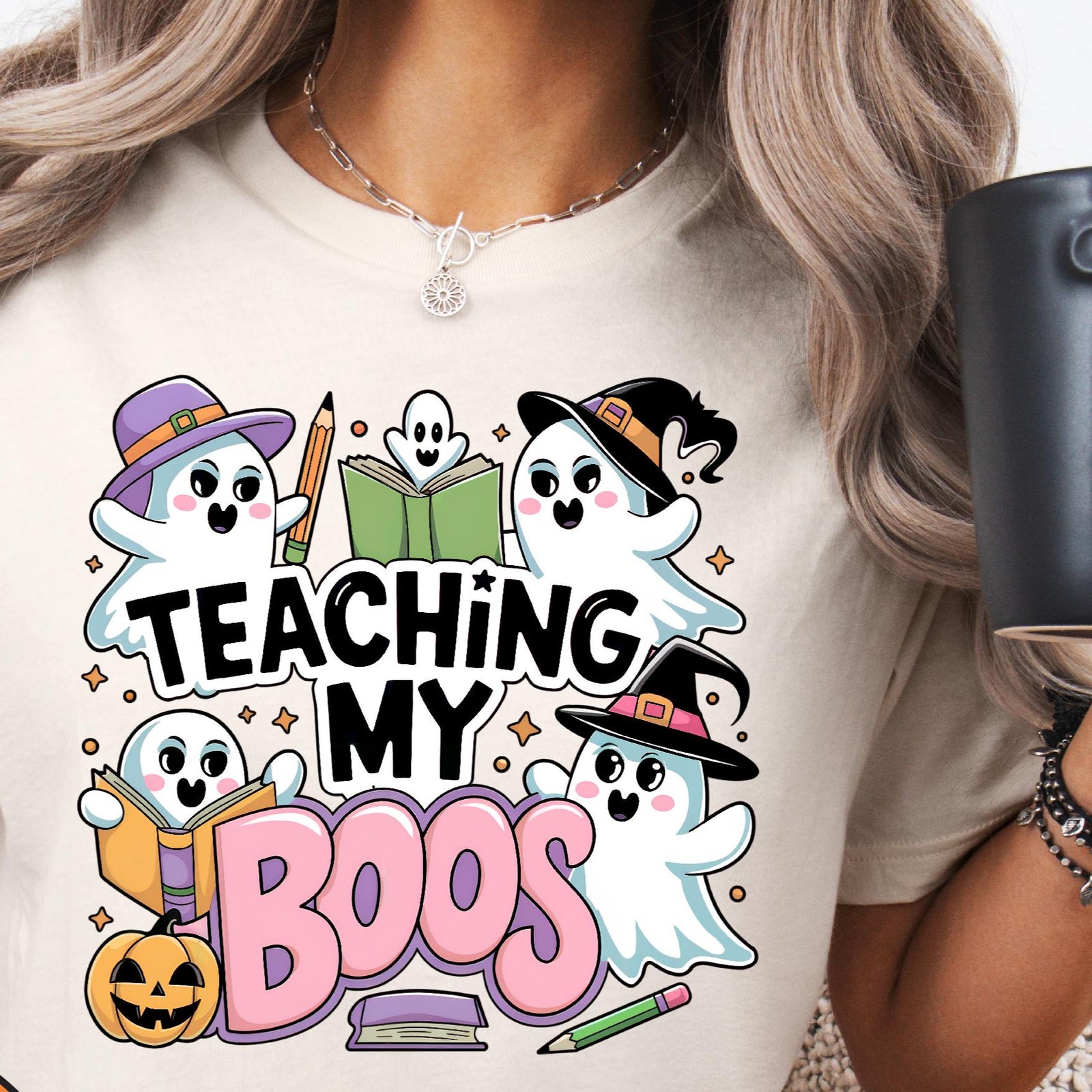 Natural t-shirt with cute ghosts in witch hats and books reading Teaching My Boos.