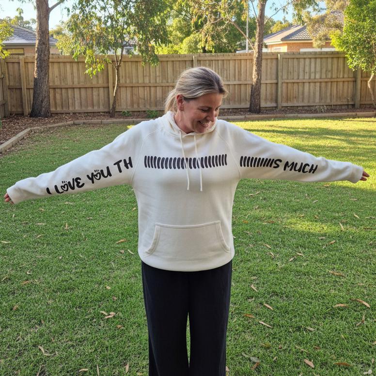 adult wearing i love you this much hoodie arms stretched sleeve print unisex fit australia
unisex hoodie i love you this much cream jumper lifestyle outdoor photo australia
matching family hoodie i love you this much design mothers day gift idea
relaxed fit hoodie sleeve print i love you this much casual wear australia