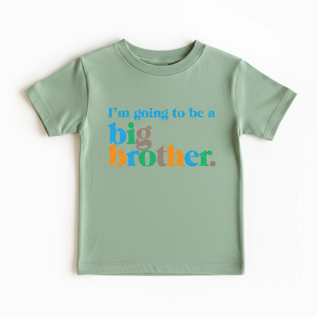 Tilly&Wilbur natural tee printed with "I'm going to be a big brother" in colourful retro lettering.
