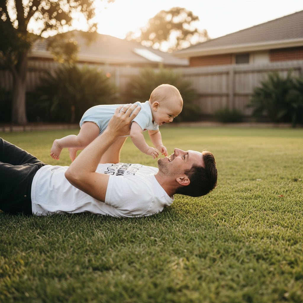 Dad wearing a white tee that reads It's My First Father's Day As A Dad.