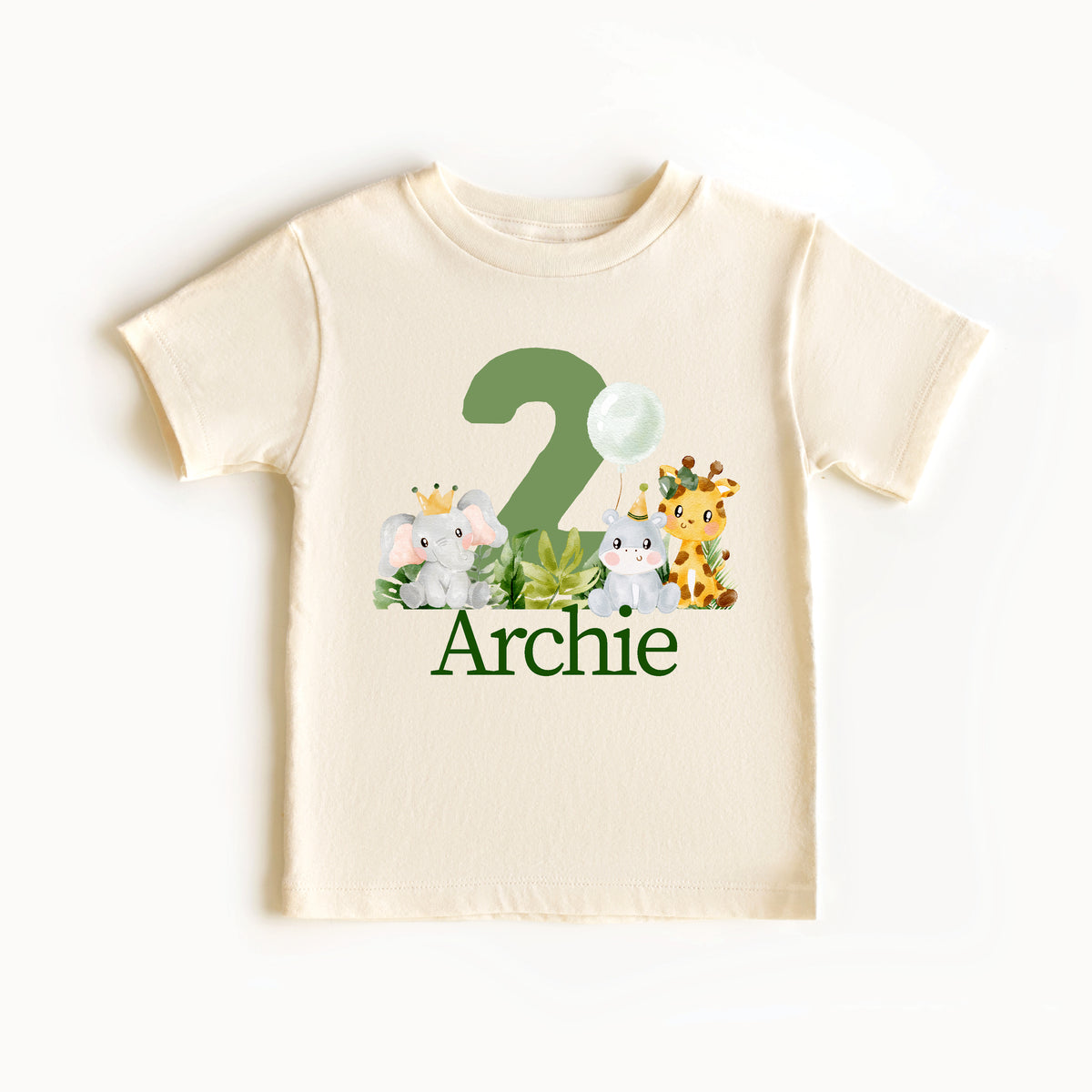 Beige t-shirt with cartoon animals and number 2, personalized with name Archie on a white background
