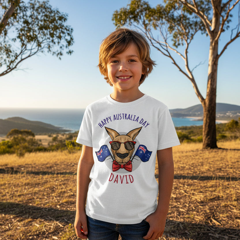 A white t-shirt with a graphic print of a cartoon kangaroo wearing sunglasses and a bow tie, with the text 'Happy Australia Day' and the name 'David'.