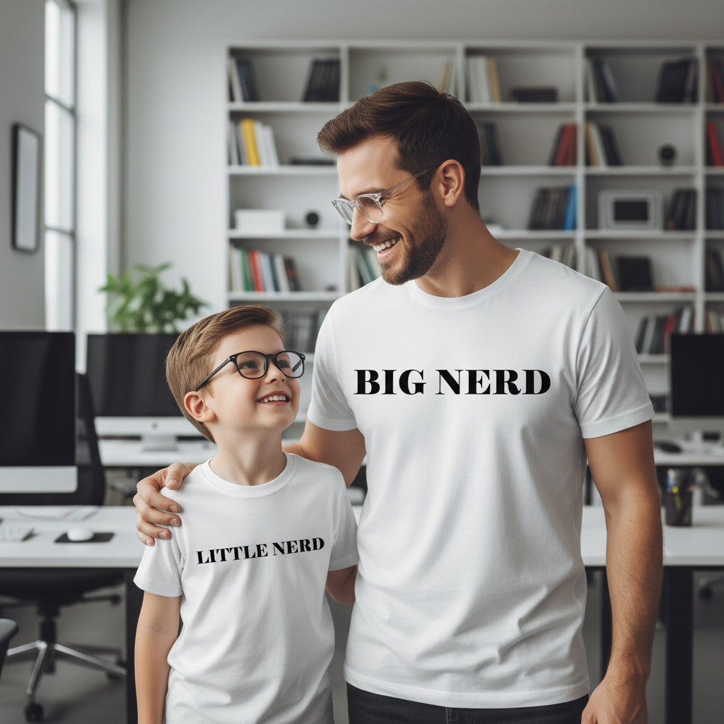 Dad and toddler doing a science experiment in matching white t-shirts reading Big Nerd and Little Nerd.