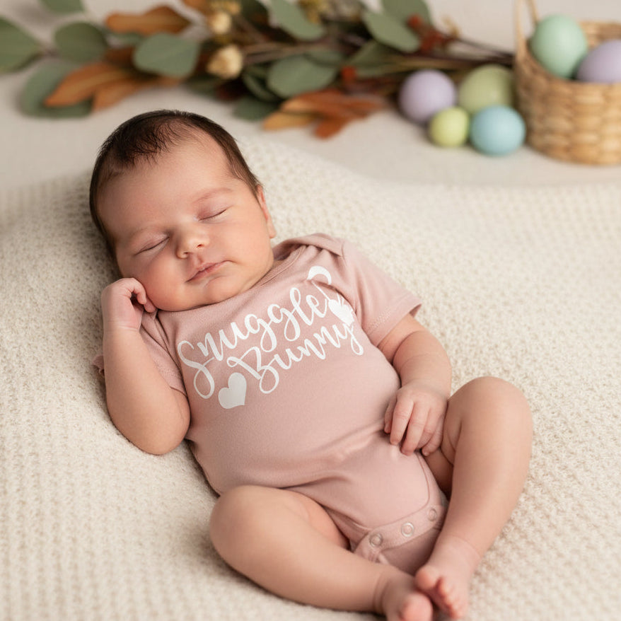 Snuggle Bunny Easter bodysuit baby outfit in soft pink with bunny ear design